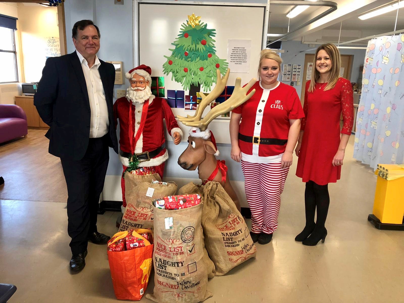 Ward Gethin Archer Staff deliver presents to Children's Ward Image